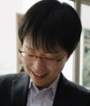 ○○主任研究員の写真