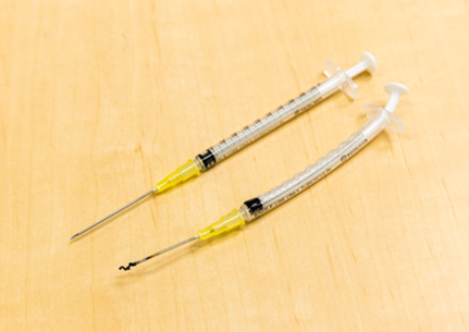 In about 10 seconds both the needle and the syringe can be simultaneously rendered harmless by fusion