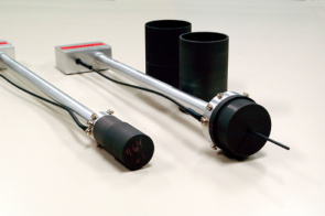 Fig.4 Cylindrical graphite cavity ionization chambers (right: approx. Φ50 x 70 mm)